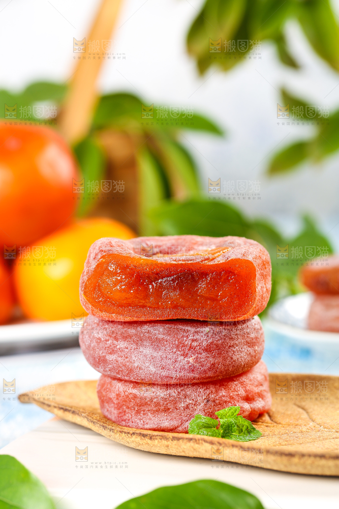白石板上一盘富平柿饼