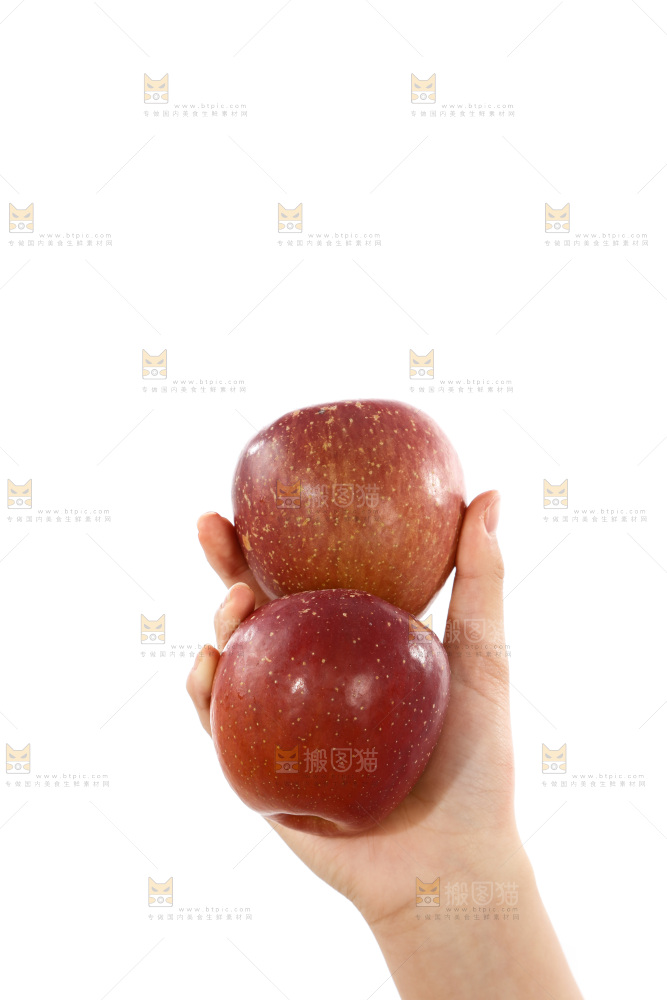 手里拿着丑苹果