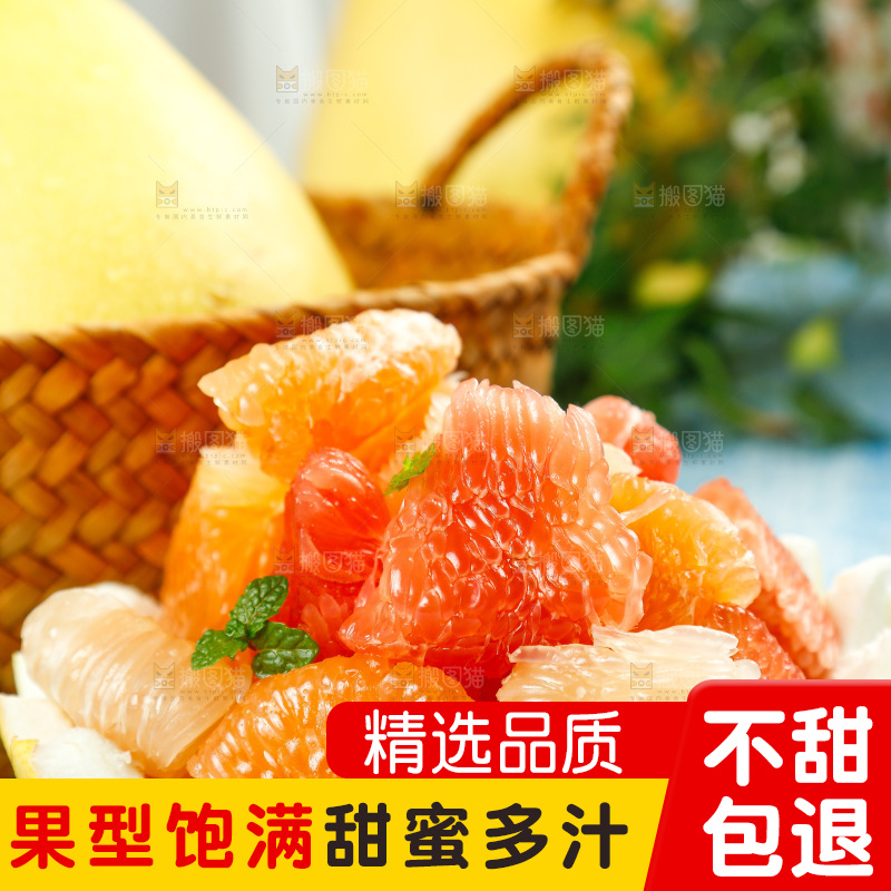 浅蓝底上一盘三色柚子