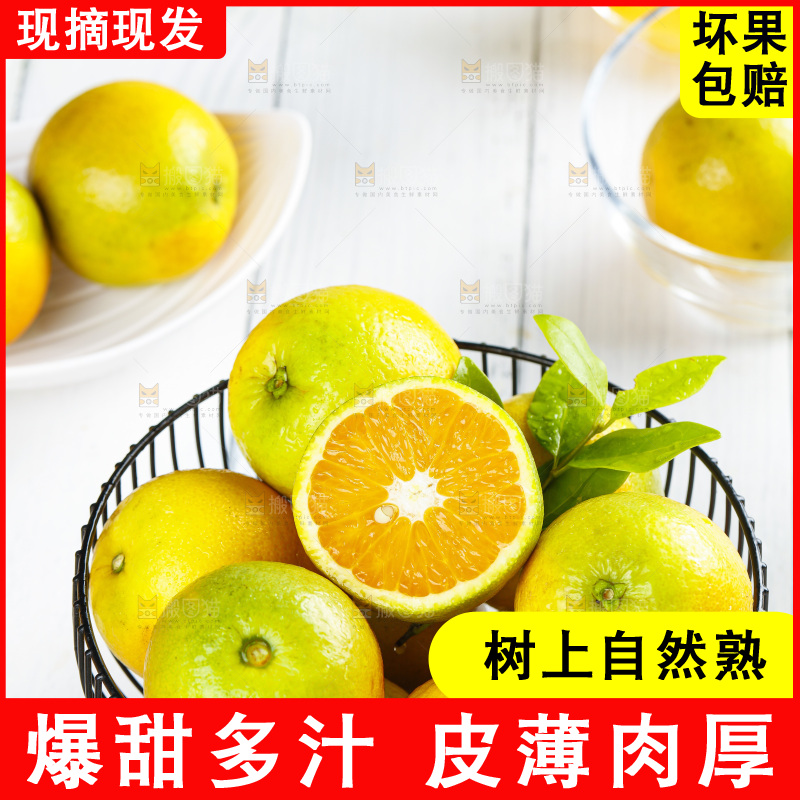 浅底上放着一筐秭归夏橙