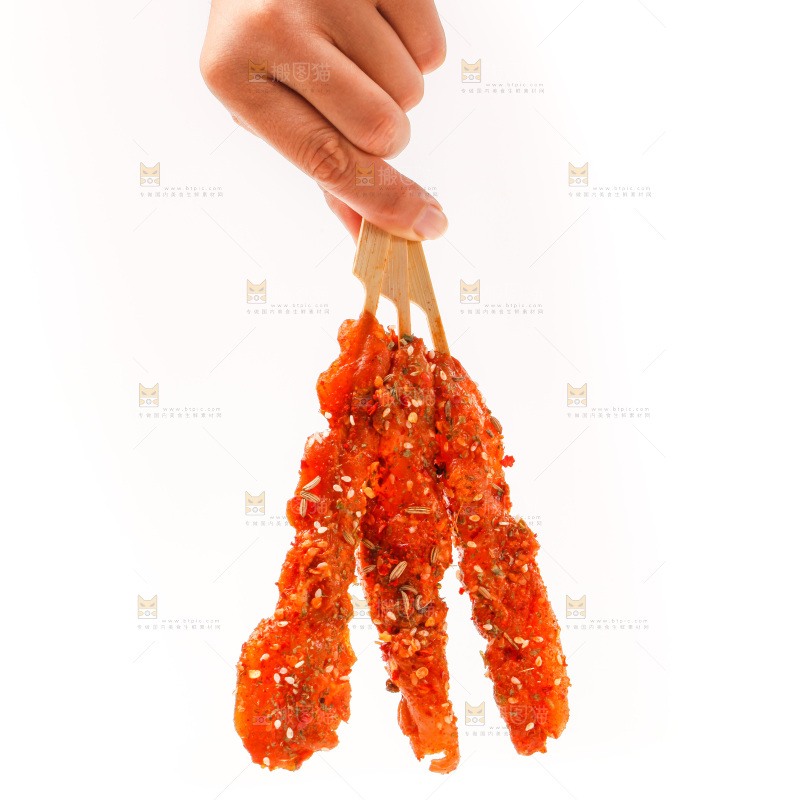 手拿肉串