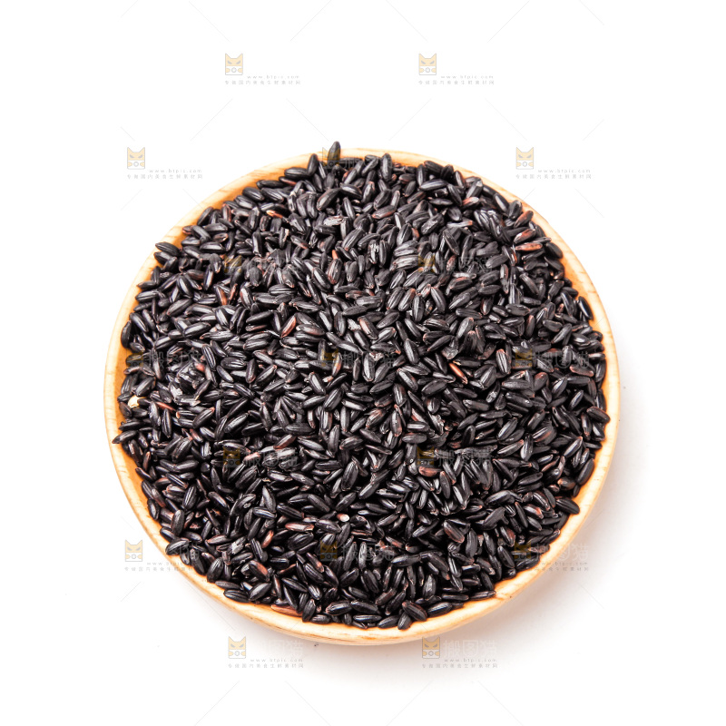 一碗东北黑米放在白底上