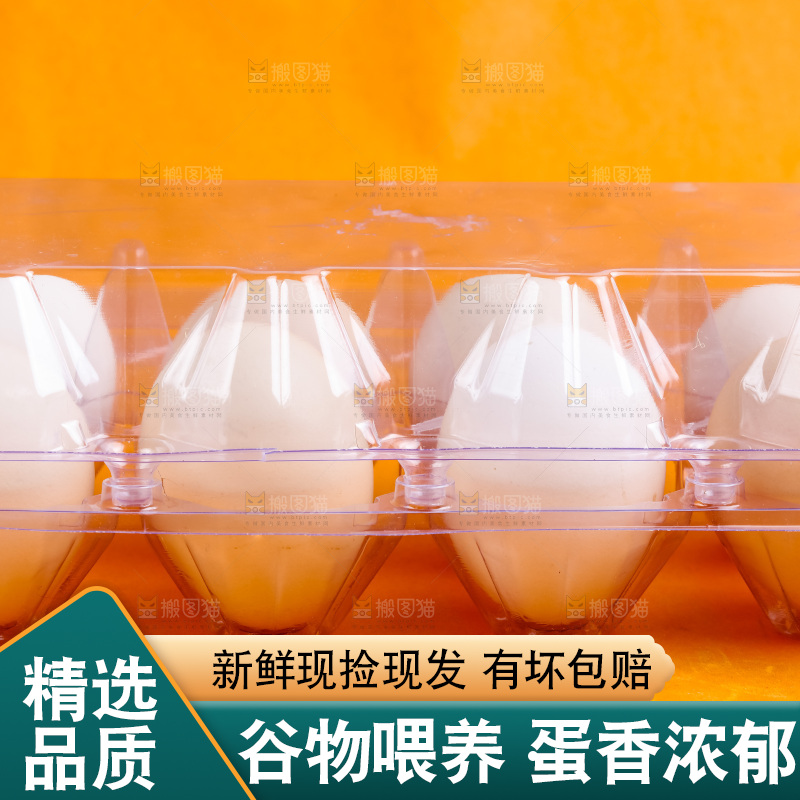 浅底上放着一盒散养鸡蛋