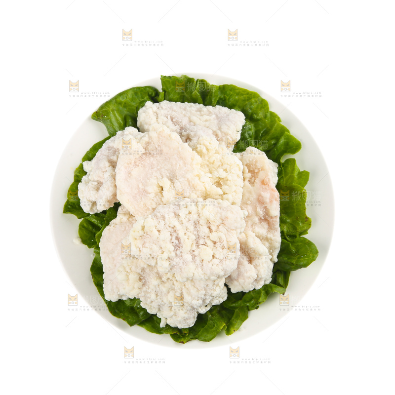 盘子里放着锅包肉
